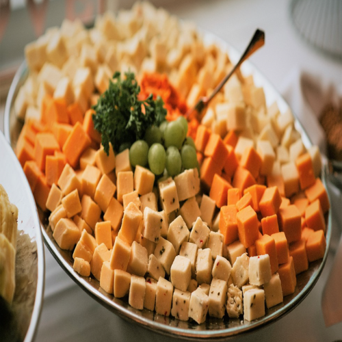platter of multiple types of cubed cheese